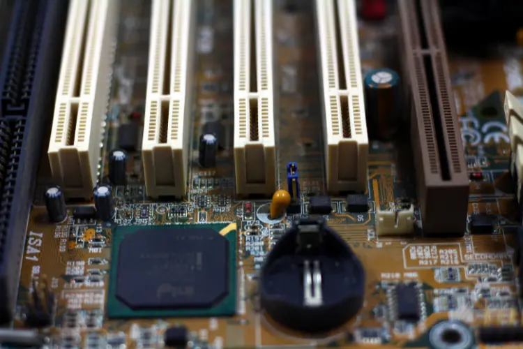 Close-up of motherboard components and expansion slots used in high-power electronic systems and heatsink applications