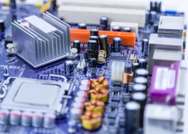Aluminum heat sink mounted on motherboard cooling electronic components in high-performance computing system